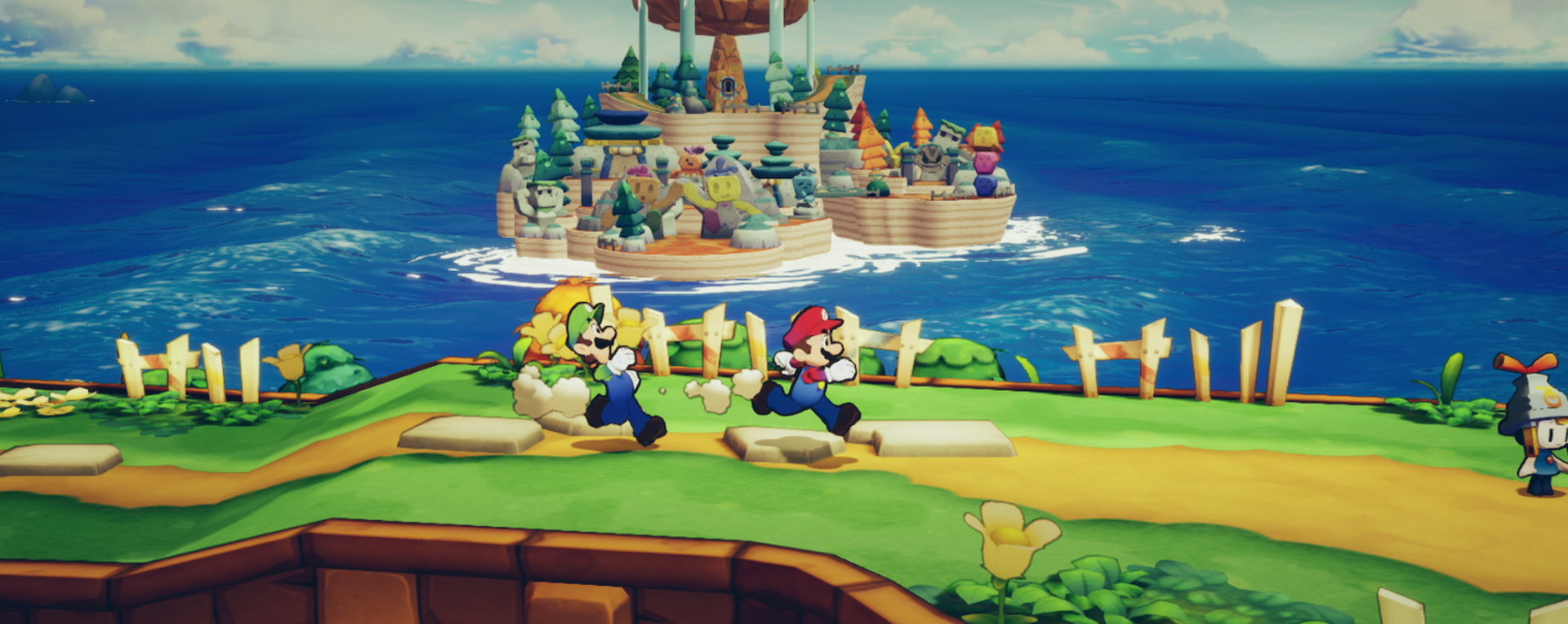 A screenshot of Mario and Luigi running along a ridge.